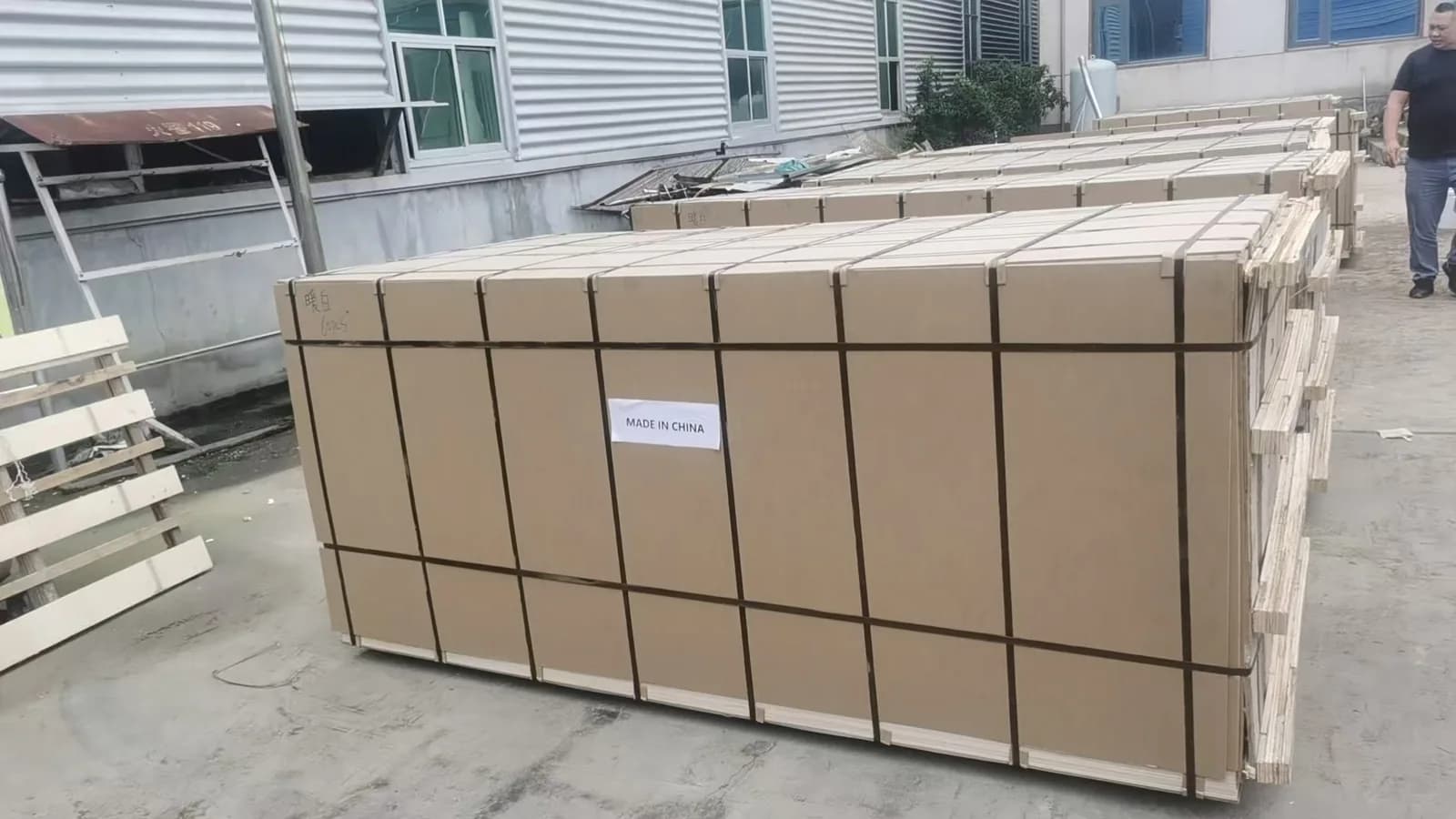 Strapped export MDF bundles prepared before container loading