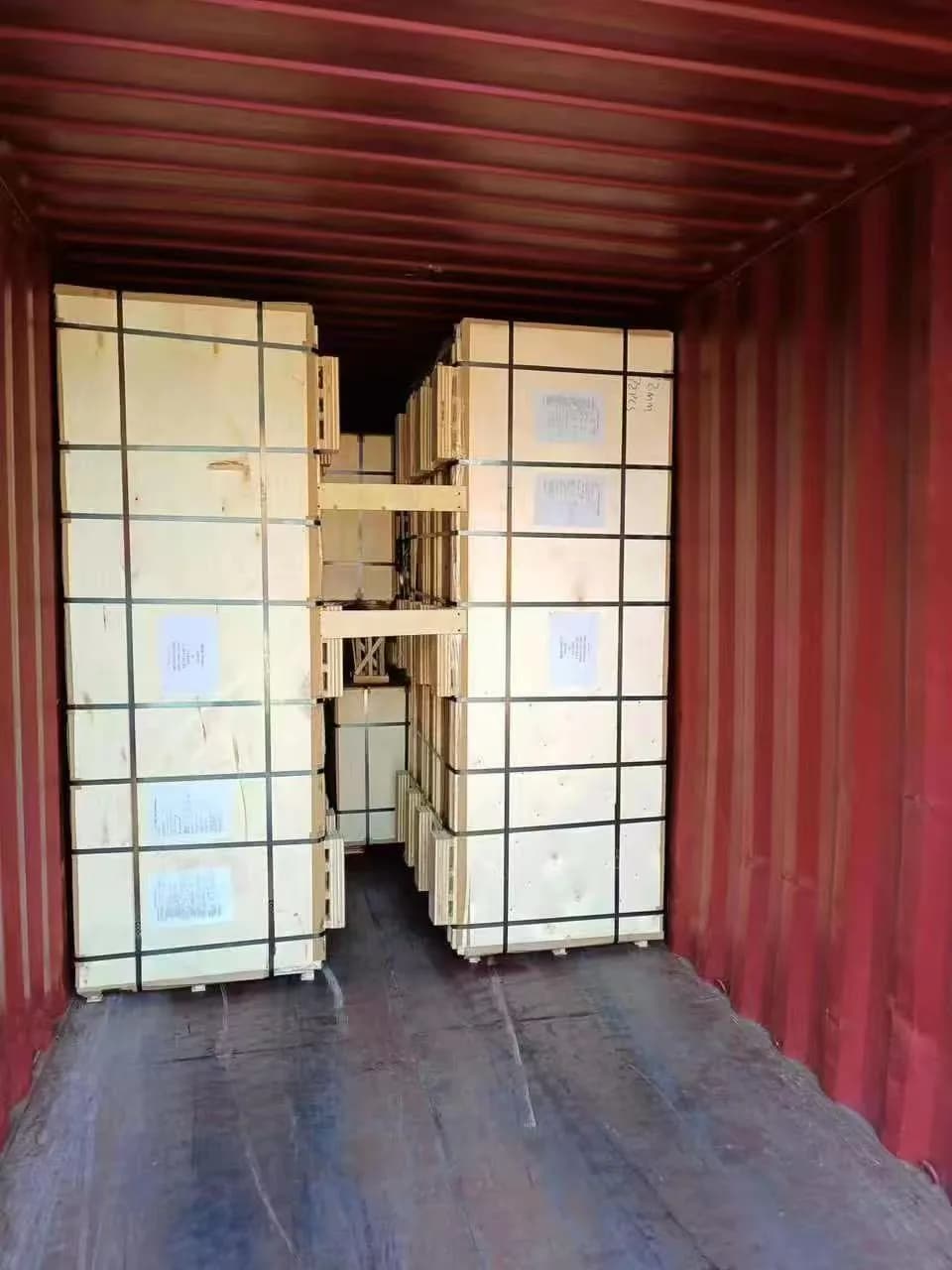 Loaded MDF bundles viewed from the container doors